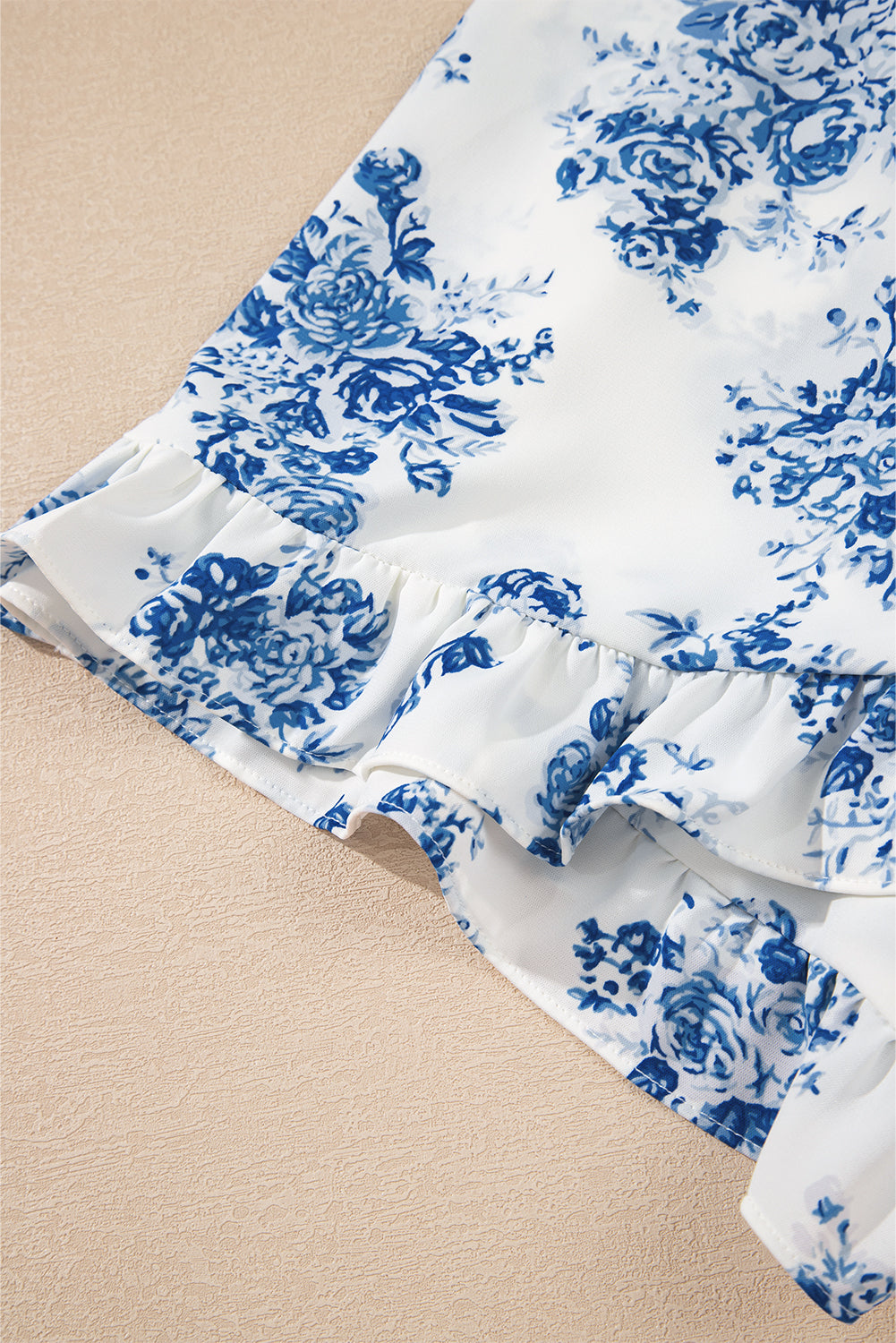 Sky Blue Floral Print Strapless Zipped Back Knot Waist Ruffled Romper